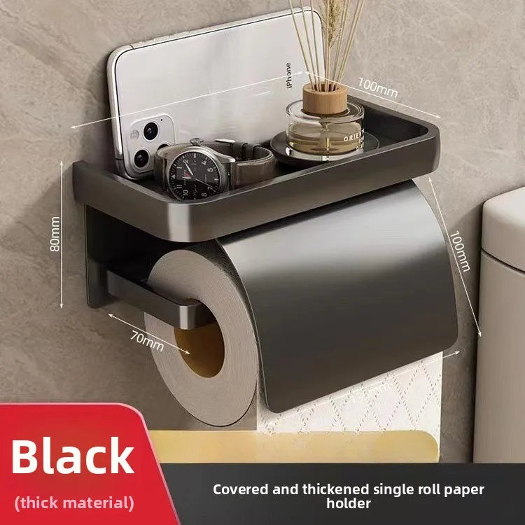 Držiak toaletného papiera do kúpeľne, namontovaný na stenu.